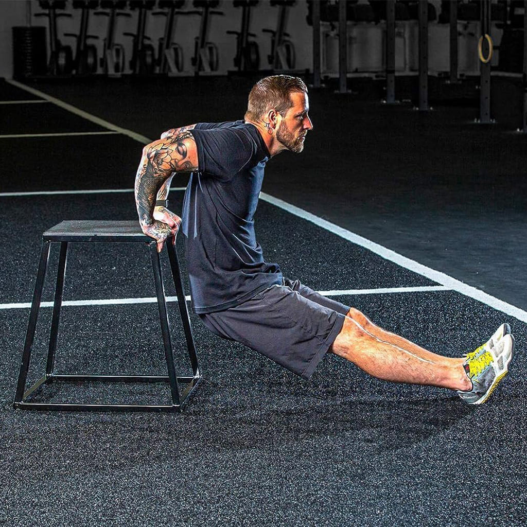 Ahoj Krása JumpForm in use, man training with dips on a sturdy box, focusing on strength and fitness.